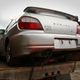 Illustration for article titled Subaru Impreza Takes A Dump Truck Ride To Guatemala